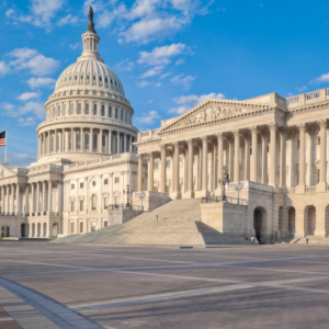 U.S. Capitol Building under blue sky.