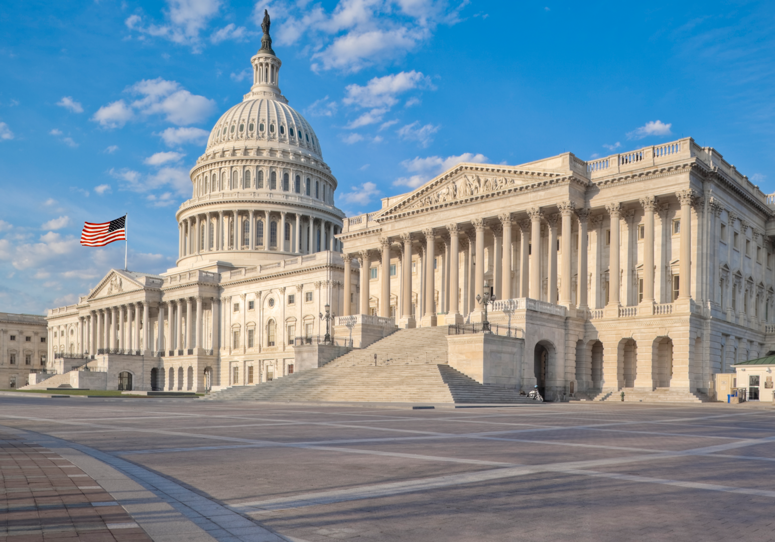 U.S. Capitol Building under blue sky.